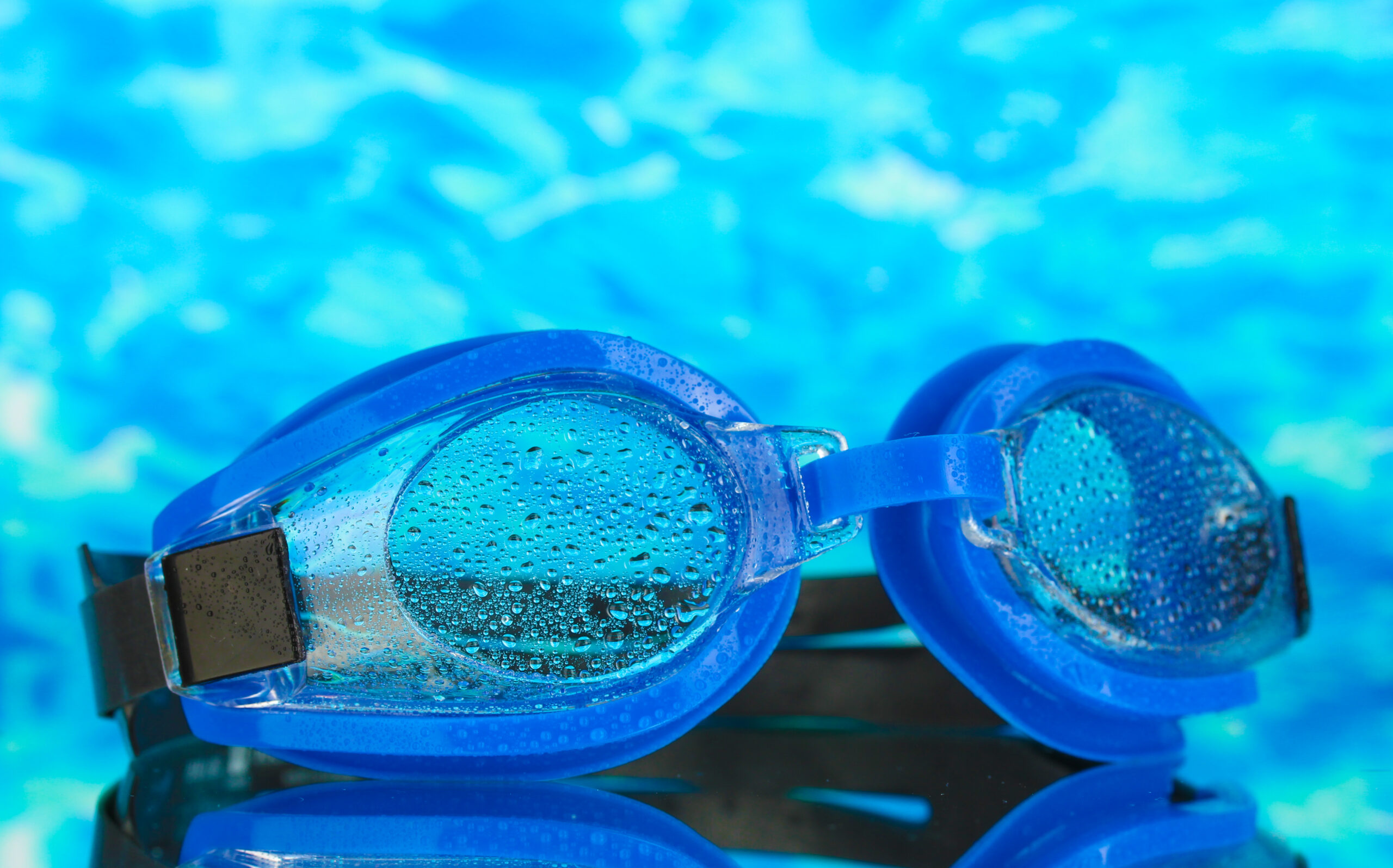 Pool goggles, protective eyewear designed for swimmers, providing clear vision underwater and protecting the eyes from chlorine or other irritants in the pool