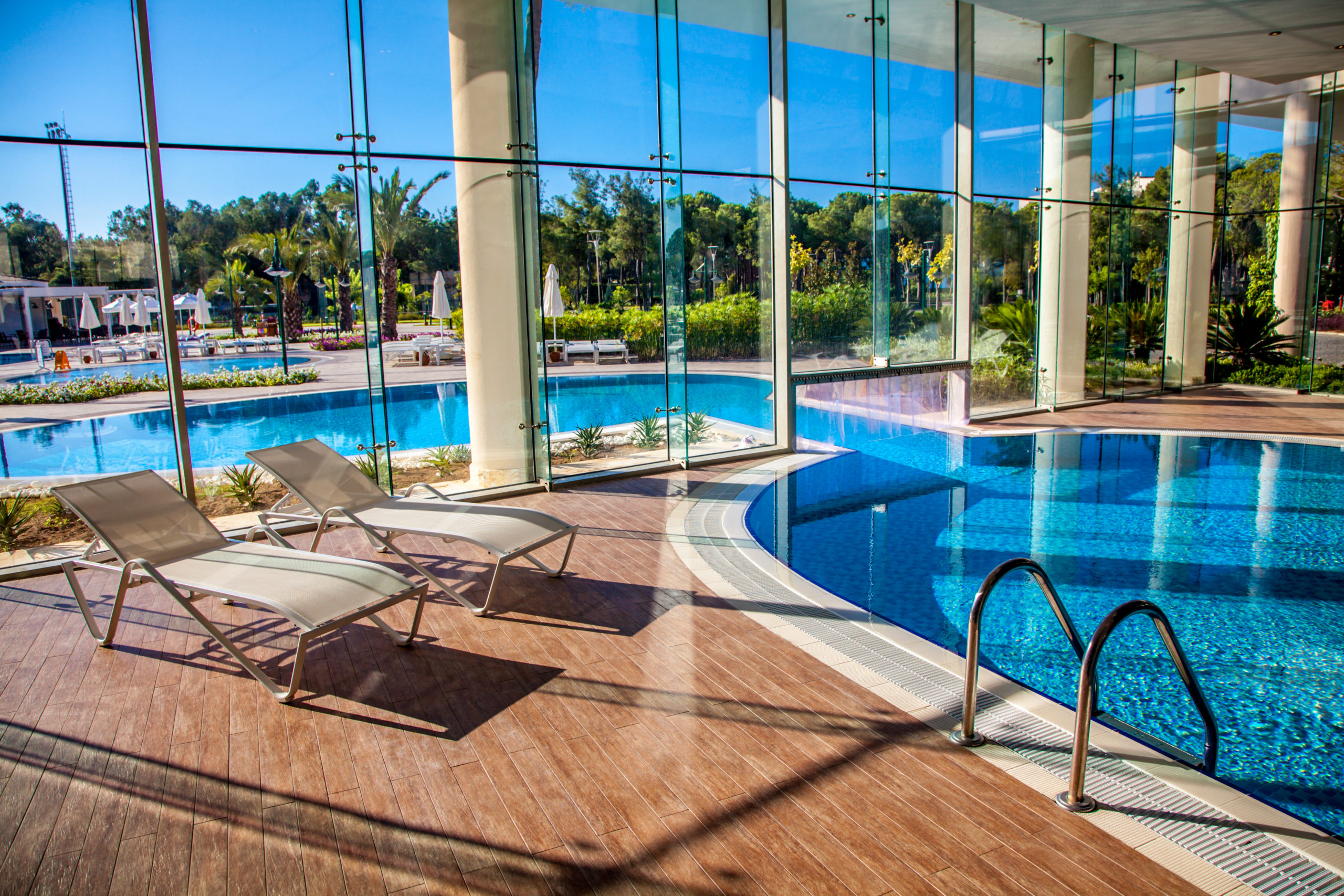 A pool with a ventilation system to ensure proper air circulation and reduce humidity within the pool area