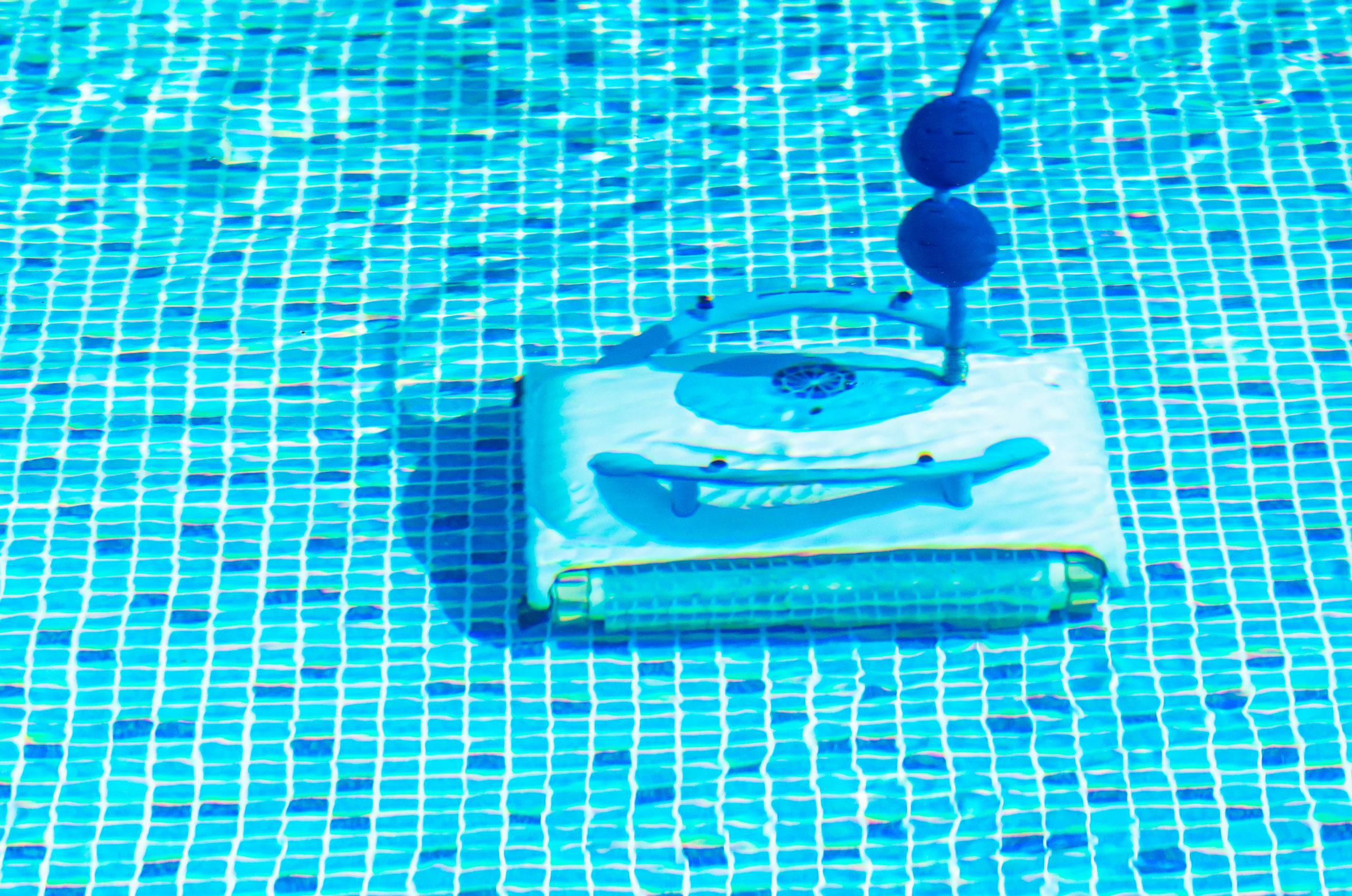 An automatic pool vacuum, a device designed to autonomously clean the pool's surface and bottom