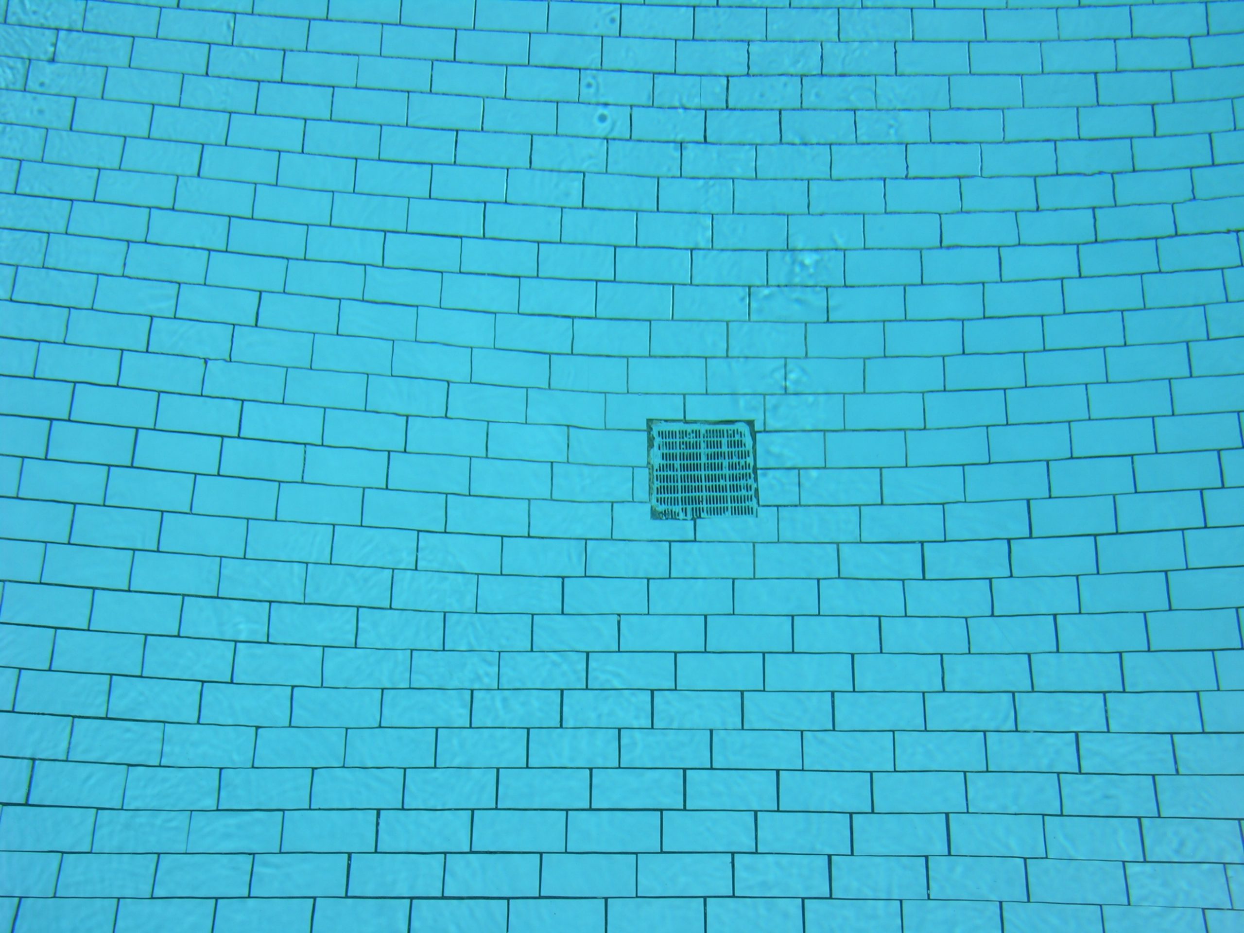 Pool drainage system designed to remove excess water from the pool for maintenance or to control water levels.