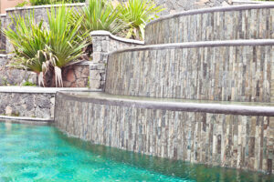 A water feature in a tropical landscaped garden