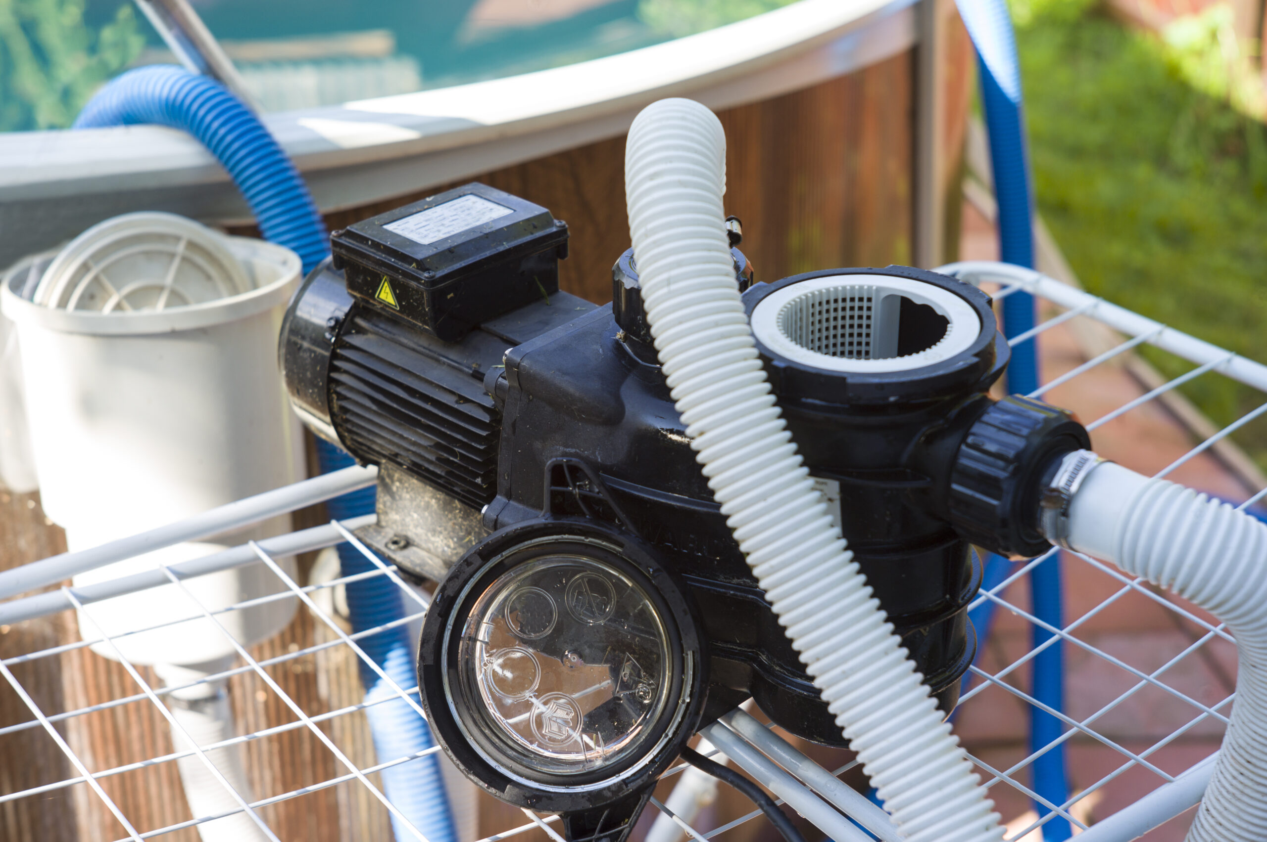 A water filter machine for a pool, an essential piece of equipment responsible for removing impurities, debris, and contaminants from the pool water, ensuring it remains clean and safe for swimming.